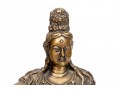 A 20th Century Asian Bronze Figure Of A Reclining Female Deity On A Rock