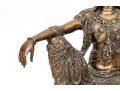 A 20th Century Asian Bronze Figure Of A Reclining Female Deity On A Rock