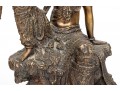 A 20th Century Asian Bronze Figure Of A Reclining Female Deity On A Rock