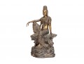 A 20th Century Asian Bronze Figure Of A Reclining Female Deity On A Rock