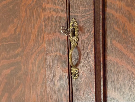 A Late 19th Century American Dark Patinated Oak Wall Mounted Medicine Cabinet
