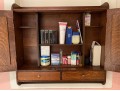 A Late 19th Century American Dark Patinated Oak Wall Mounted Medicine Cabinet