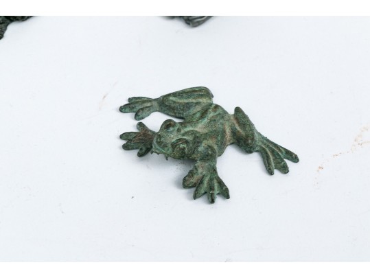Collection Of Seven Metal Frog Figures