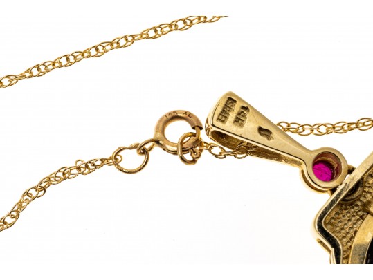 14K Necklace With A Coin Set Pendant