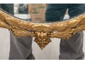 Antique Carved And Gilt Mirror With Eagle Crest