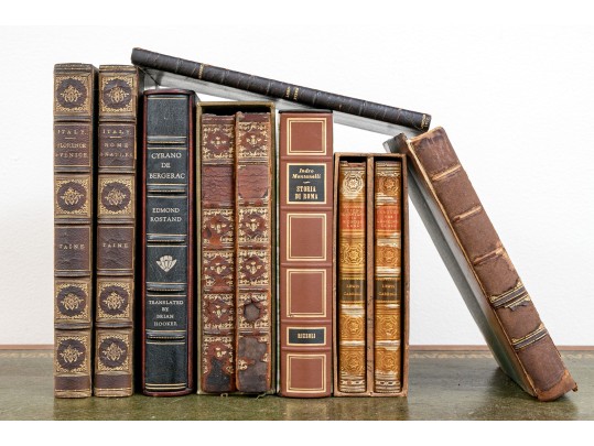 A Group Of Leather Hard Bound Books