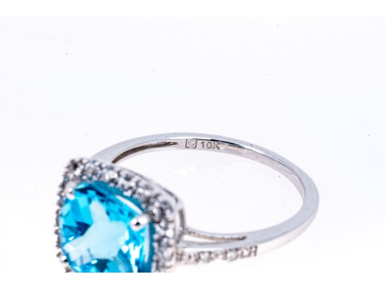 Vibrant 10K White Gold And Blue Topaz Ring, Size 7+