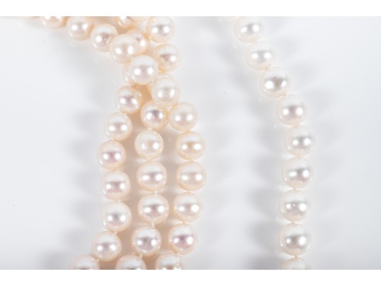 Four Similar Knotted Large Cultured Pearl Necklaces With 14k Yellow Gold Claps