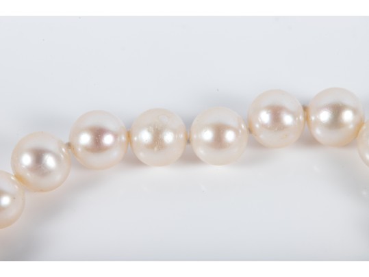 Four Similar Knotted Large Cultured Pearl Necklaces With 14k Yellow Gold Claps