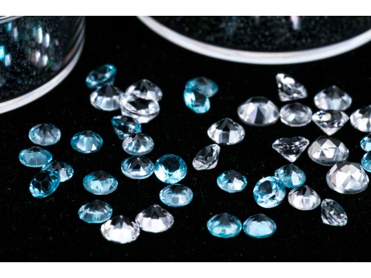 Loose Stones: 50 White, Blue And Mystic Topaz, 17.7 TCW