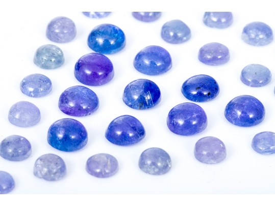Loose Stones: 35 Round Cabochon Tanzanites, 15.68 TCW