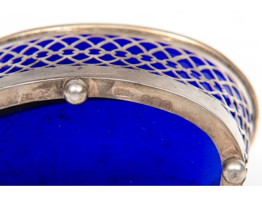 Four Sterling Salts With Blue Glass Inserts