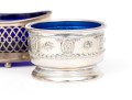 Four Sterling Salts With Blue Glass Inserts
