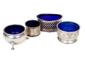 Four Sterling Salts With Blue Glass Inserts
