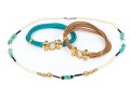 Lot Of Three Blue And Tan Jewelry Pieces, Including Two Cord Bracelets And A Beaded Necklace