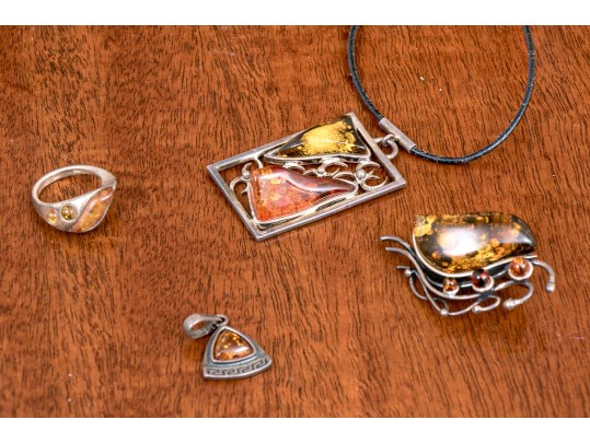 Collection Of Amber Mounted Sterling Jewelry