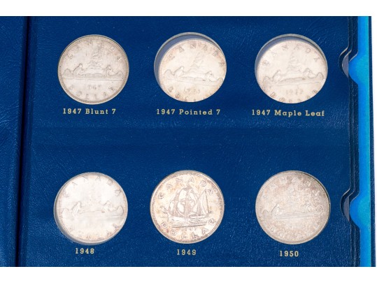 Collection Of 29 Canadian Silver Dollars