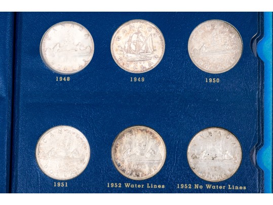 Collection Of 29 Canadian Silver Dollars