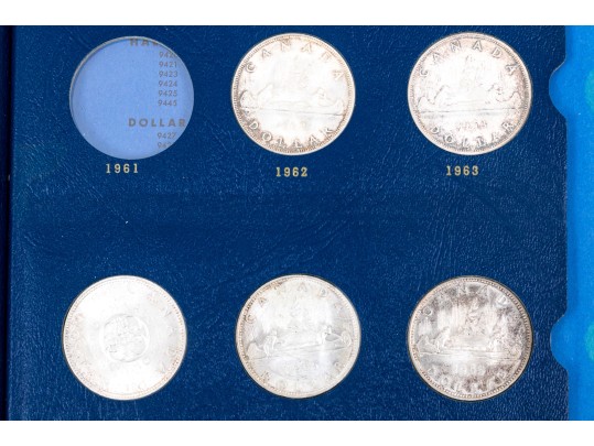 Collection Of 29 Canadian Silver Dollars