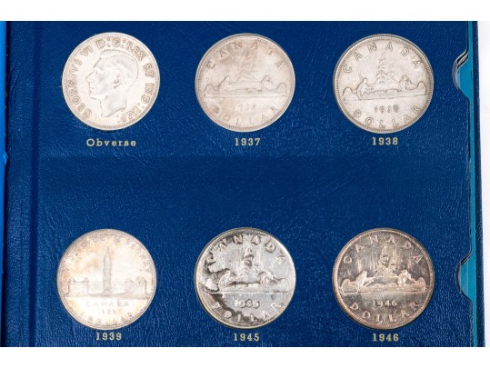 Collection Of 29 Canadian Silver Dollars