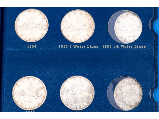 Collection Of 29 Canadian Silver Dollars