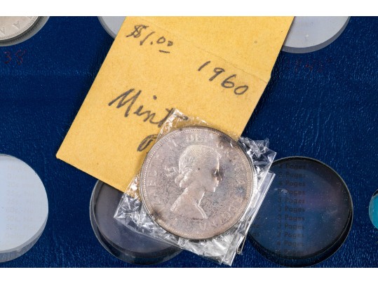 Collection Of 24 Canadian Silver Dollars