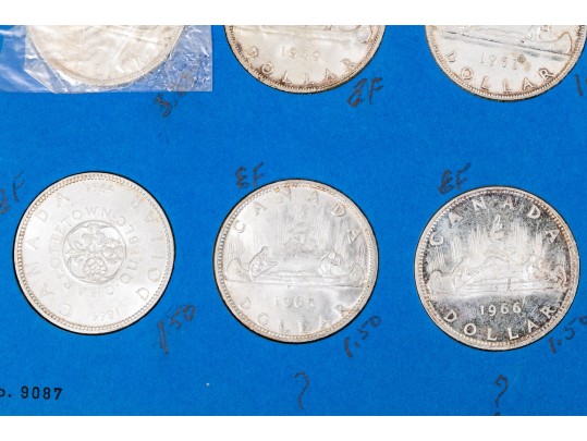 Collection Of 24 Canadian Silver Dollars