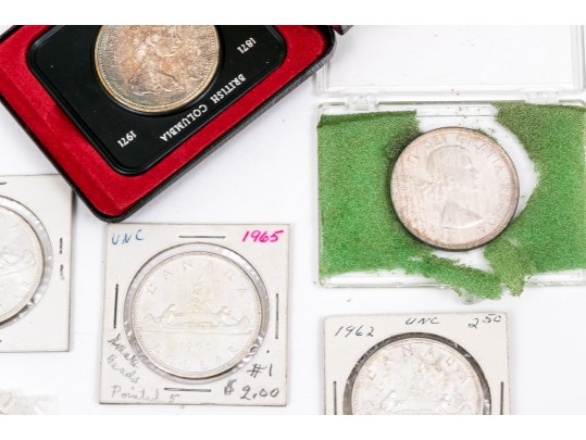 Collection Of 9 Canadian Silver Dollars