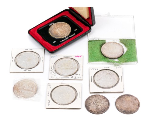 Collection Of 9 Canadian Silver Dollars