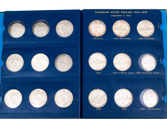 Collection Of 29 Canadian Silver Dollars