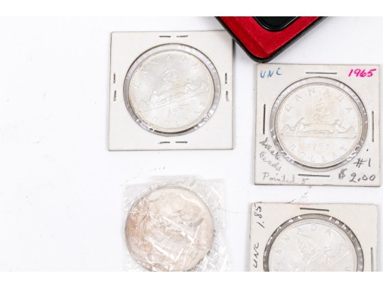 Collection Of 9 Canadian Silver Dollars