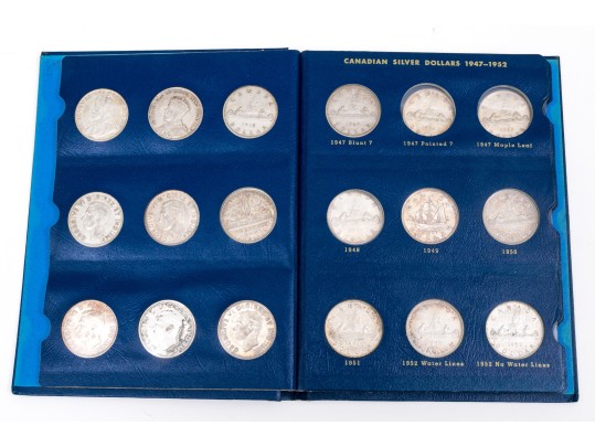 Collection Of 29 Canadian Silver Dollars