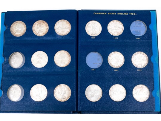 Collection Of 29 Canadian Silver Dollars