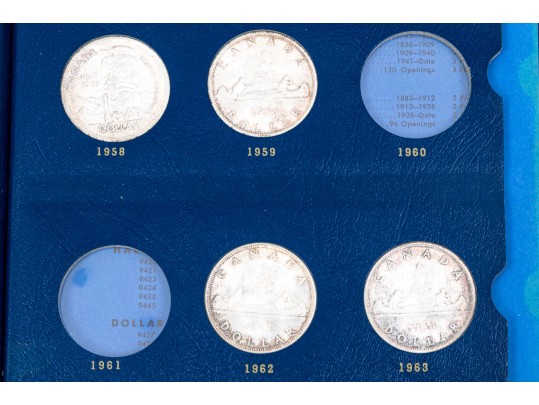 Collection Of 29 Canadian Silver Dollars