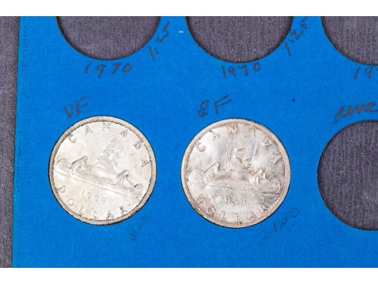 Collection Of 24 Canadian Silver Dollars