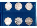 Collection Of 29 Canadian Silver Dollars