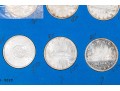 Collection Of 24 Canadian Silver Dollars