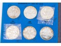 Collection Of 24 Canadian Silver Dollars