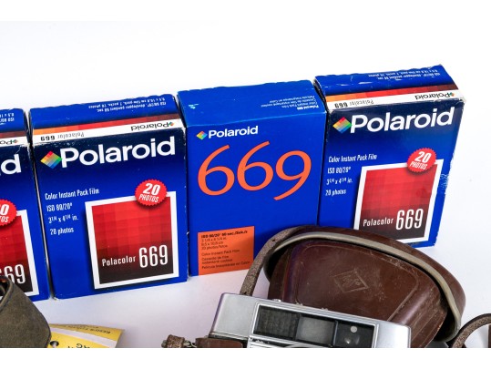 Group Of Vintage Cameras And Film