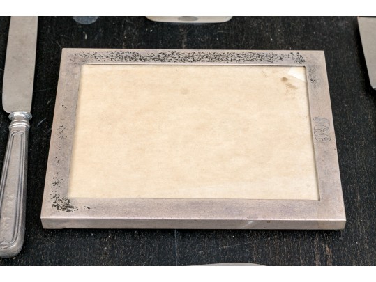 Collection Of Miscellaneous Silver Plated Flatware Utensils With An Inkwell And Picture Frame