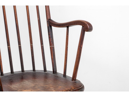 An Antique Tall Comb Back Windsor Arm Chair