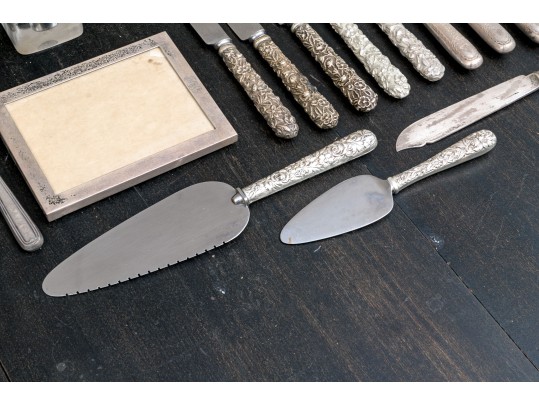 Collection Of Miscellaneous Silver Plated Flatware Utensils With An Inkwell And Picture Frame