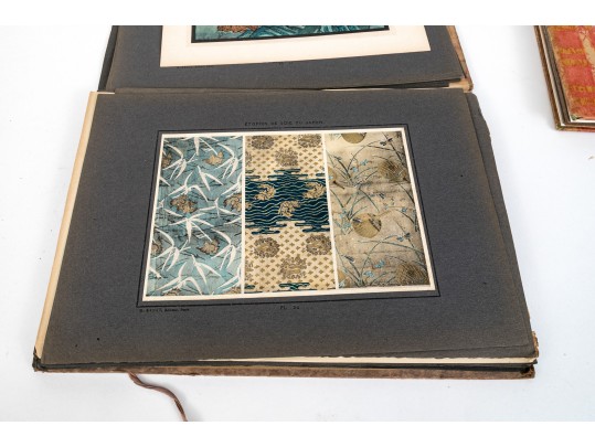 A Group Of Three Vintage Bound Books And Loose Print