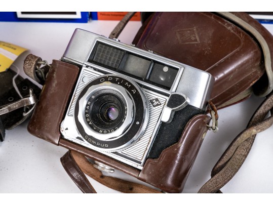 Group Of Vintage Cameras And Film