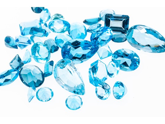 Loose Stones: 38 Topaz Stones, Shades Of Blue, 67.3 TCW