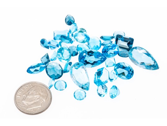 Loose Stones: 38 Topaz Stones, Shades Of Blue, 67.3 TCW