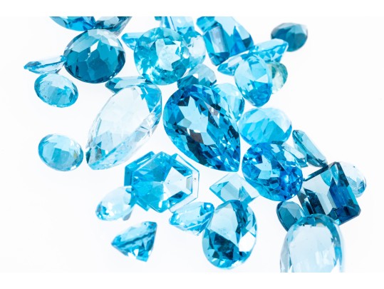 Loose Stones: 38 Topaz Stones, Shades Of Blue, 67.3 TCW