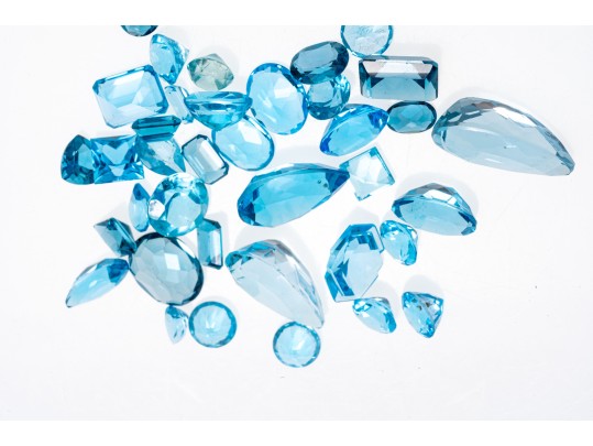 Loose Stones: 38 Topaz Stones, Shades Of Blue, 67.3 TCW
