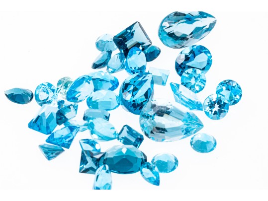 Loose Stones: 38 Topaz Stones, Shades Of Blue, 67.3 TCW
