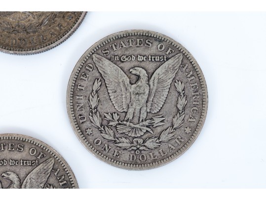 Four Morgan Silver Dollars